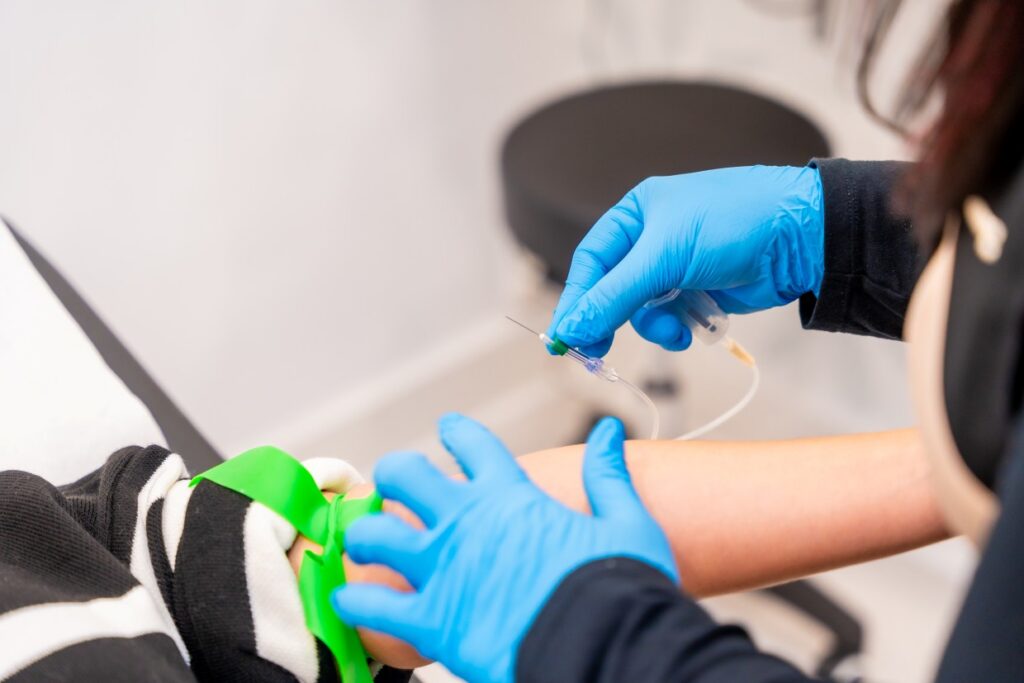 expertise extracting blood in a modern beauty clinic